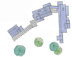 Seven households live together in four buildings that form a wide V-shaped compound facing a sunny clearing.